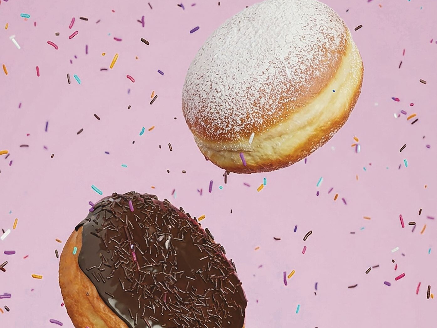 Süßes zu Karneval Eine Gruppe von Donuts in der Luft.